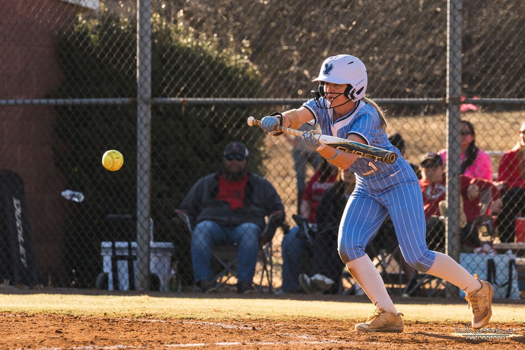 UMW Softball Player bunting