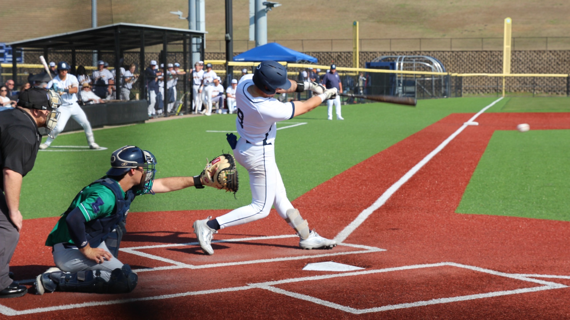 Cory Parker hitting a baseball