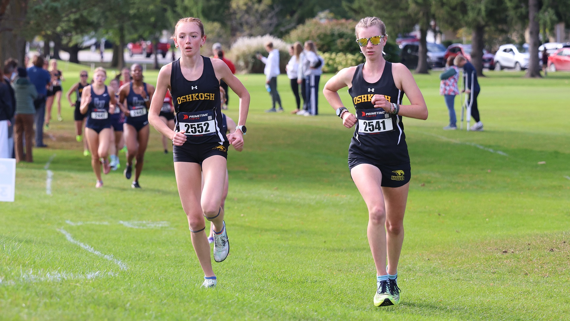 2025 Lehna Mitchell (left) and Gwen Feitl (right) Action Shot, running at the Lawrence Gene Davis Invitational