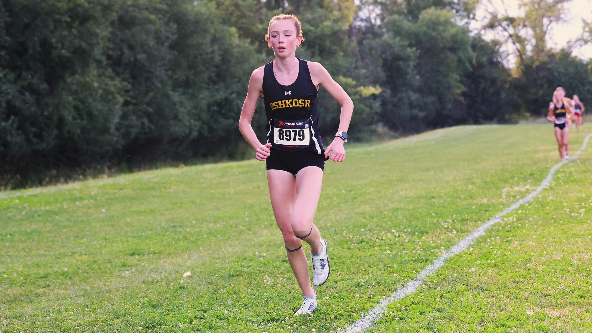 2025 Lehna Mitchell Action Shot, running at the Oshkosh Titan Fall Classic