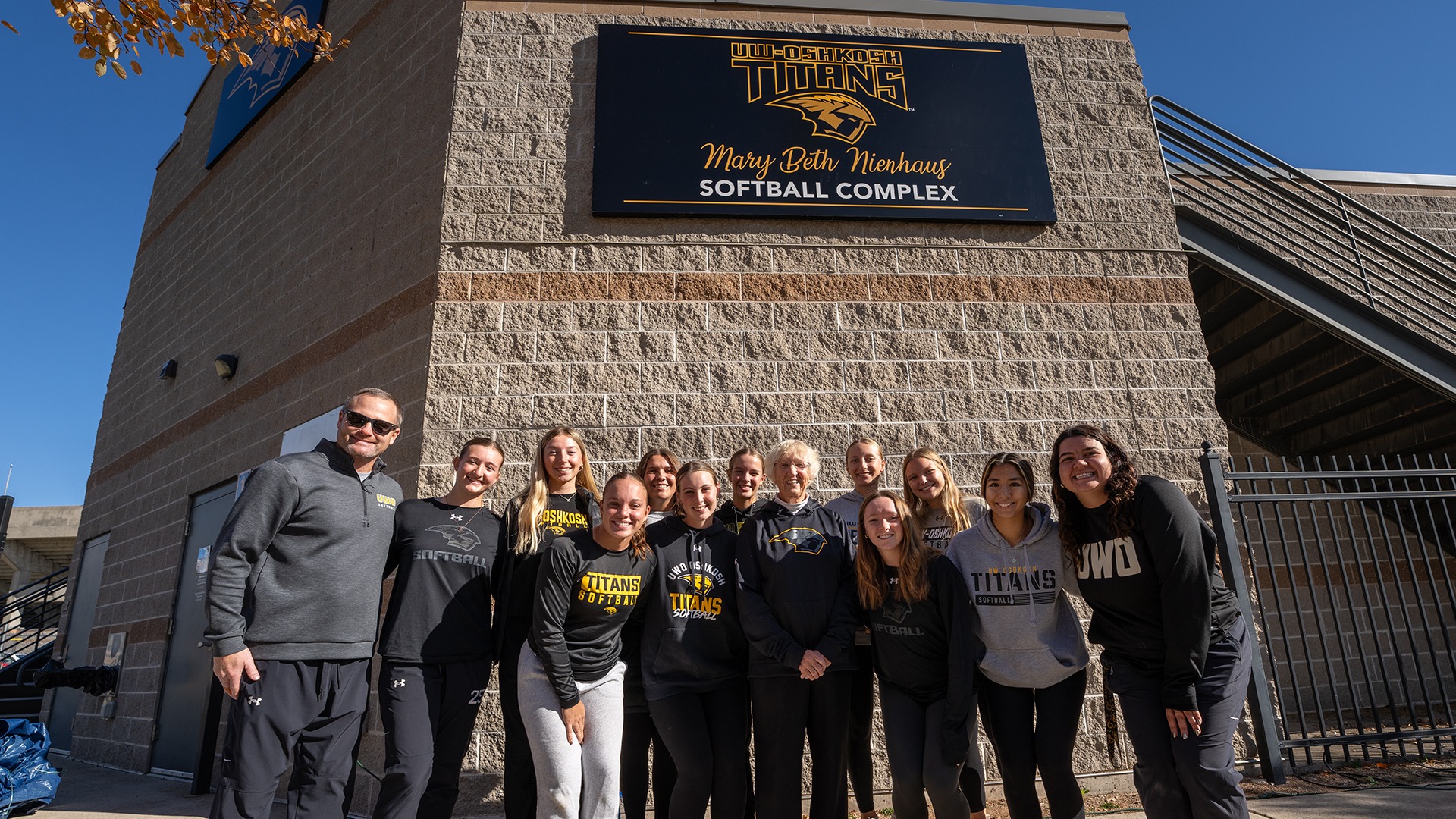 Mary Beth Nienhaus Softball Complex Dedication with Team