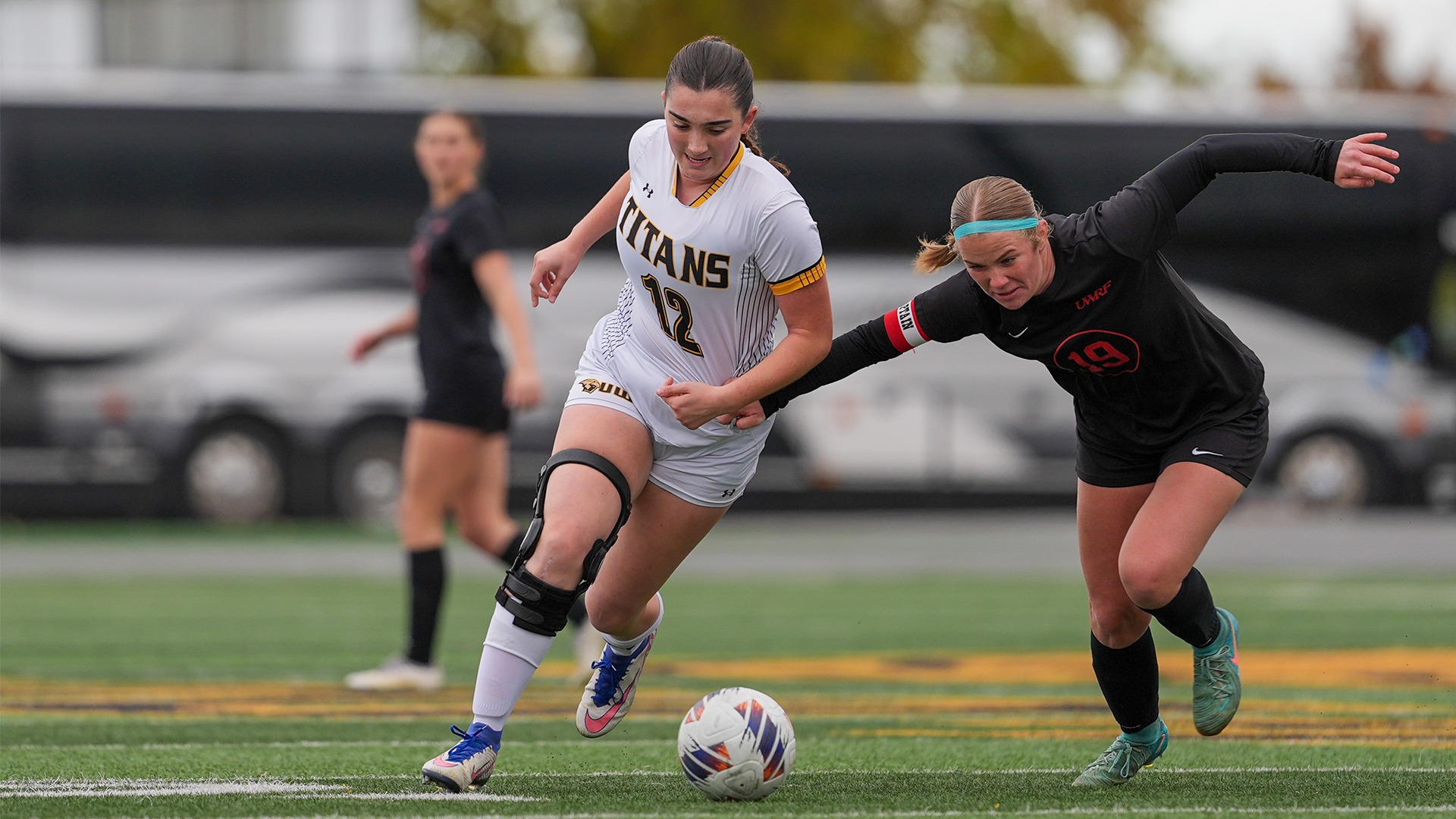 2025 Maddie Daigle Action Shot, dribbling the ball downfield against River Falls