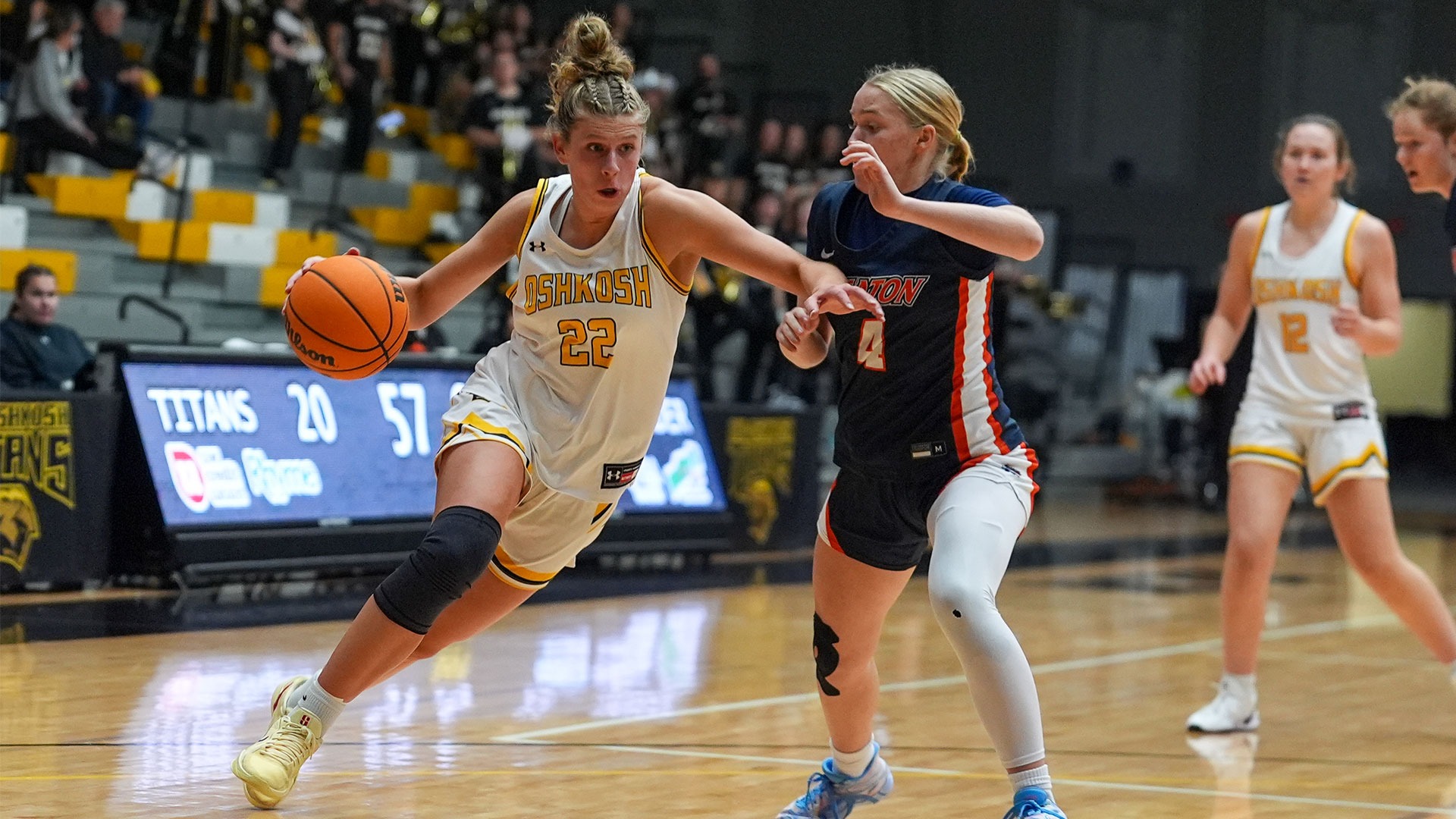 2025 Paige Seckar Action Shot, driving past a Wheaton defender