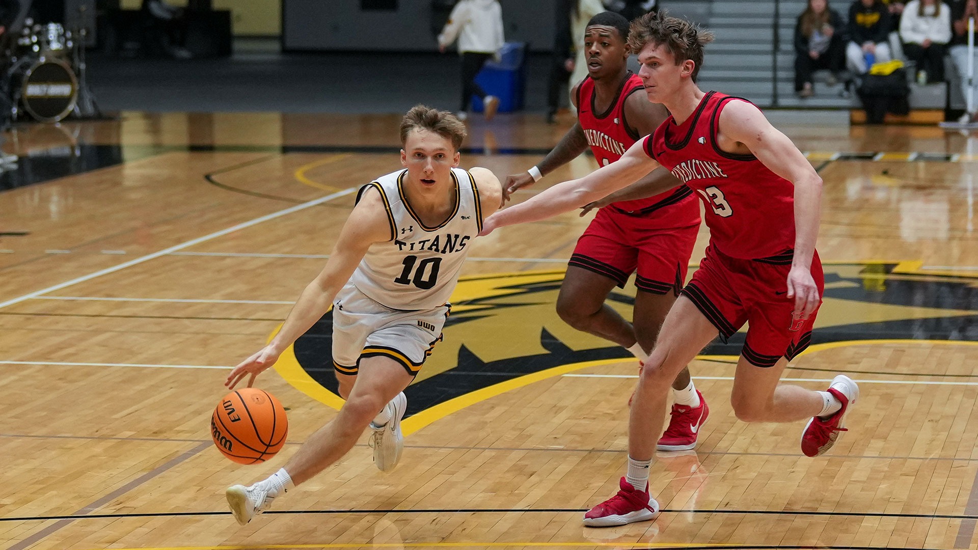 2025 Nate Nazos Action Shot, driving to the basket against Benedictine