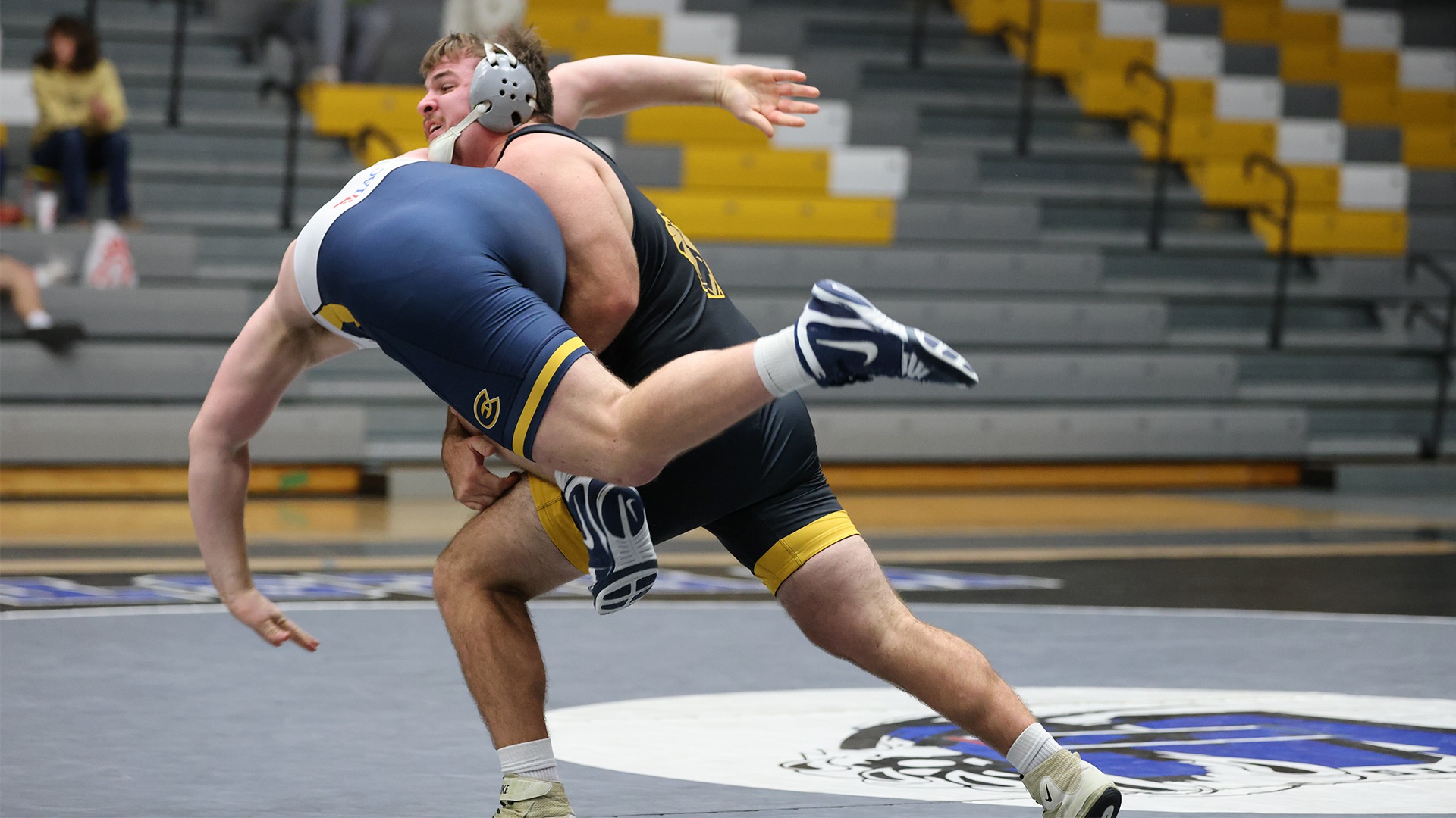 2025 Garth Martell Action Shot, taking down an Eau Claire opponent