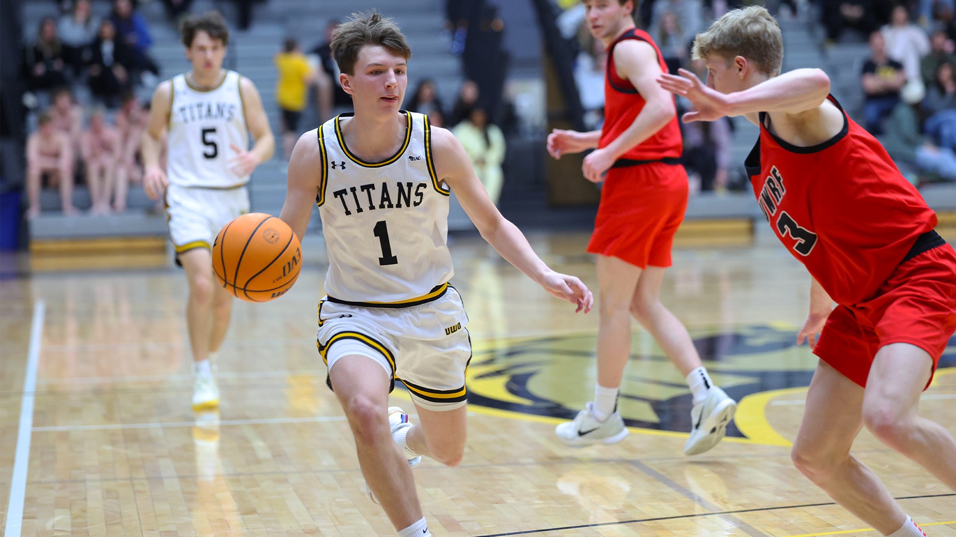 2026 Aiden Hawkinson Action Shot, dribbling downcourt against River Falls