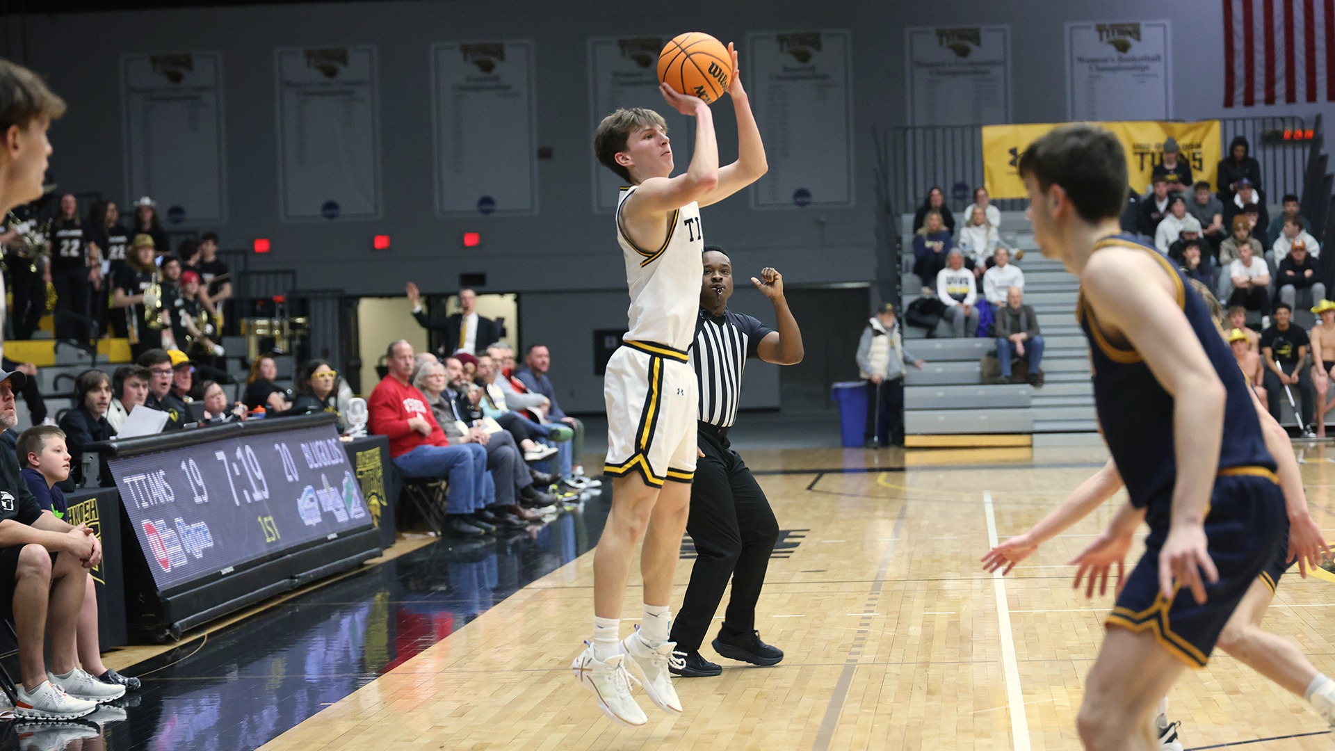 2026 Aiden Hawkinson Action Shot, attempting a 3-pointer against Eau Claire
