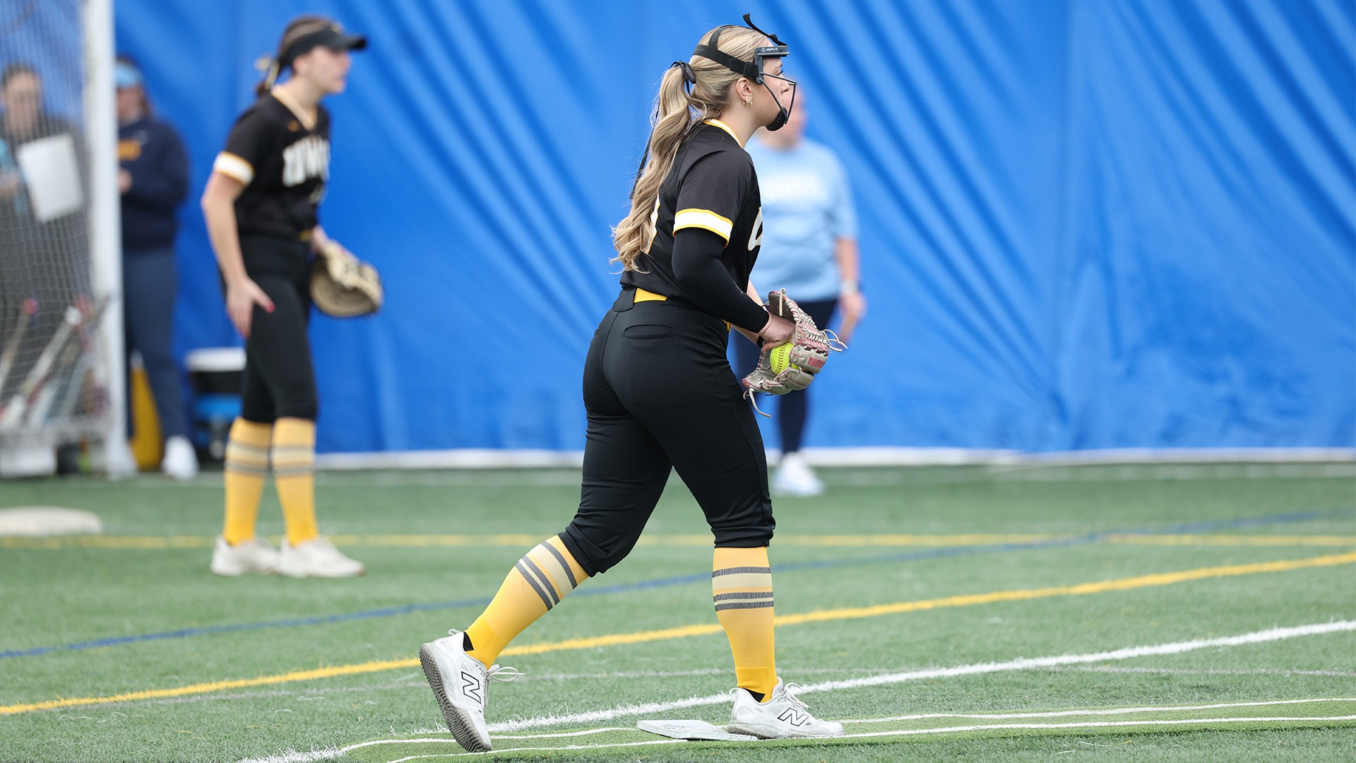 2026 Grace Nardi Action Shot, pitching against St. Scholastica