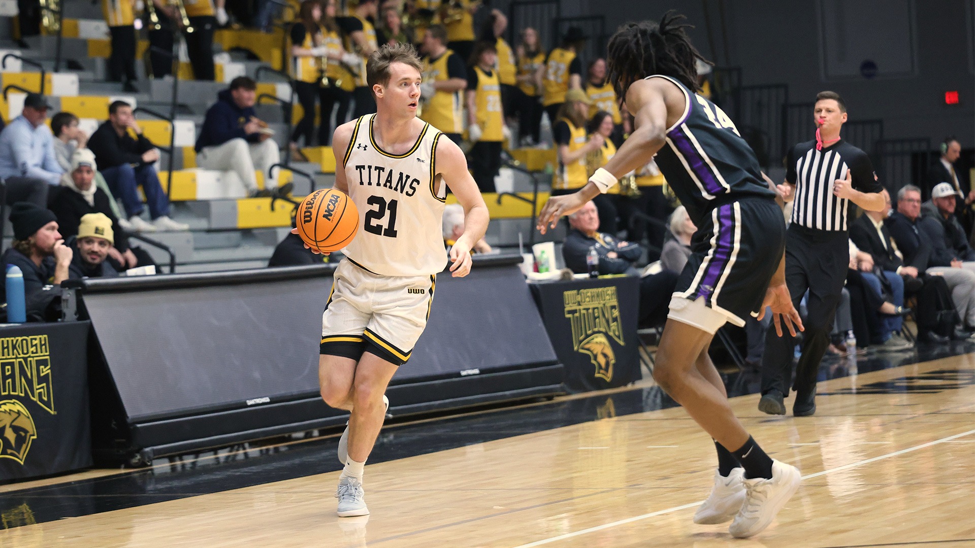2026 Carter Thomas Action Shot, dribbling downcourt against Whitewater
