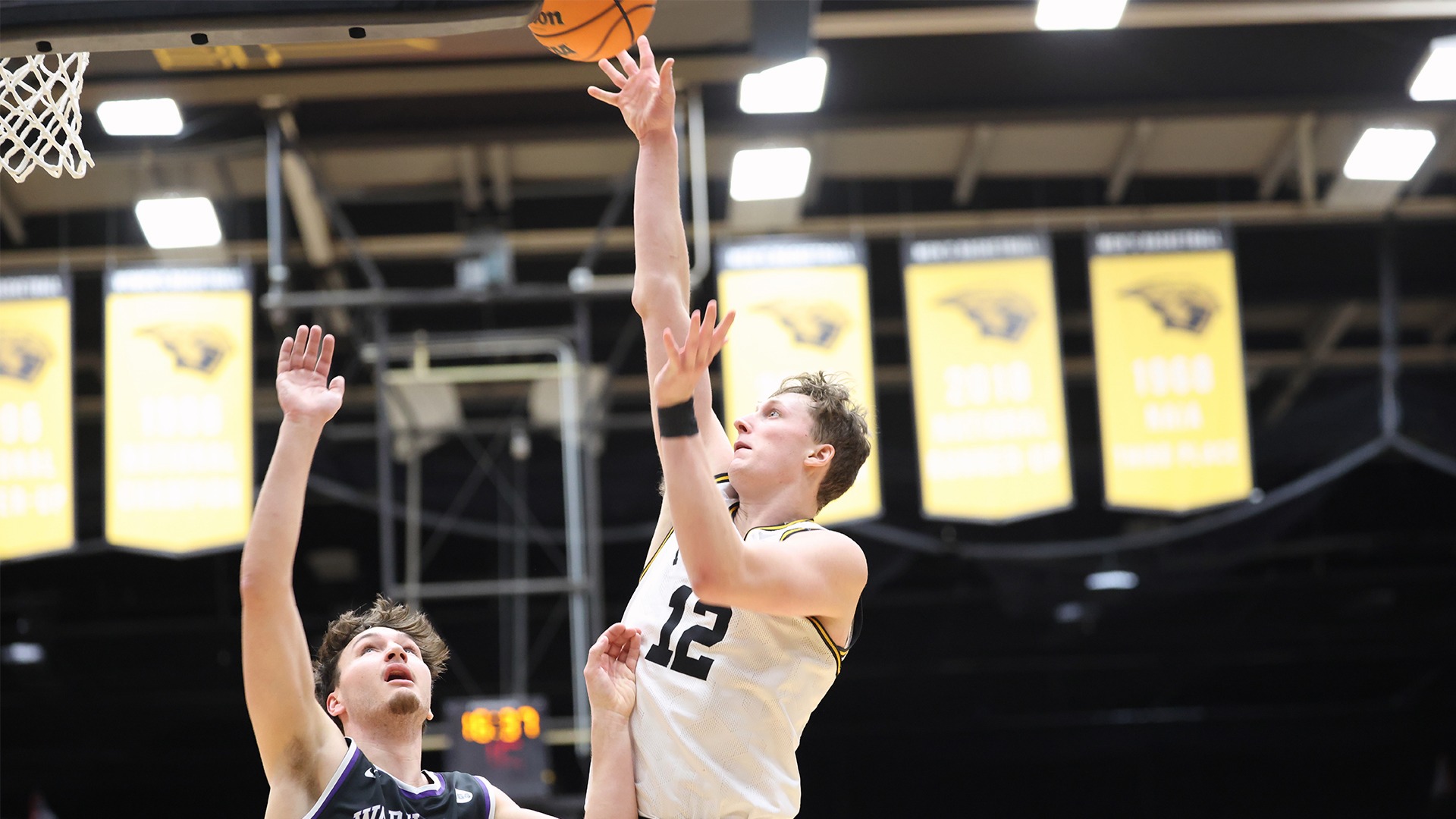 2026 Jonah Rindfleisch Action Shot, going up for a layup against Whitewater