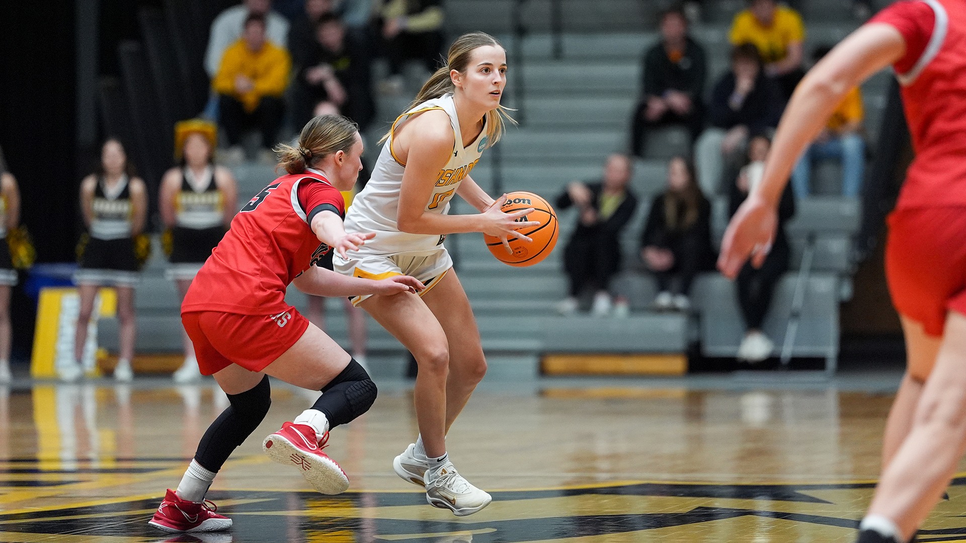 2026 Kate Huml Action Shot, looking to pass the ball against WashU in the NCAA Tournament