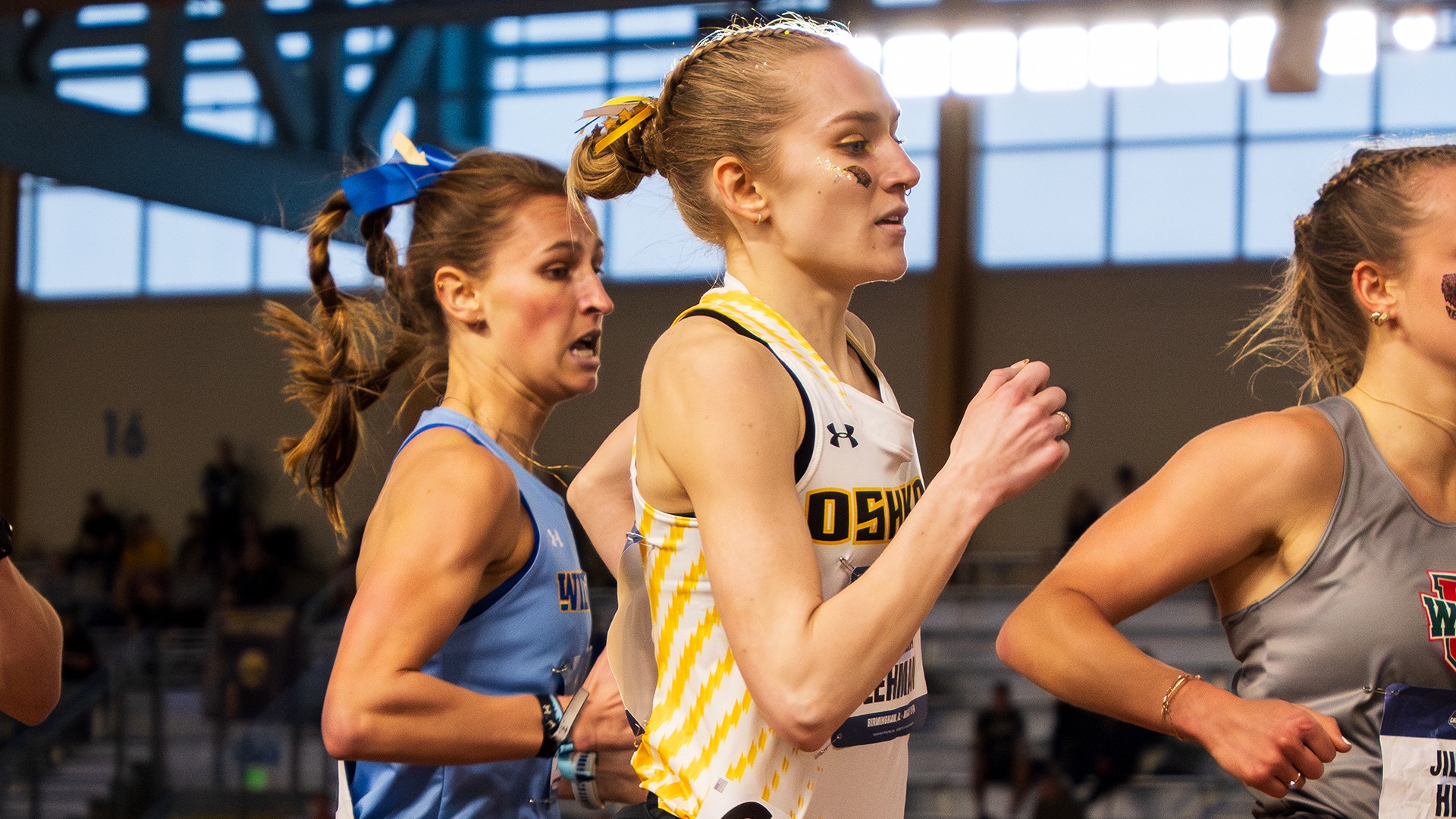 2026 Amelia Lehman Action Shot, running in the preliminary round of the mile run at the NCAA Indoor Championship