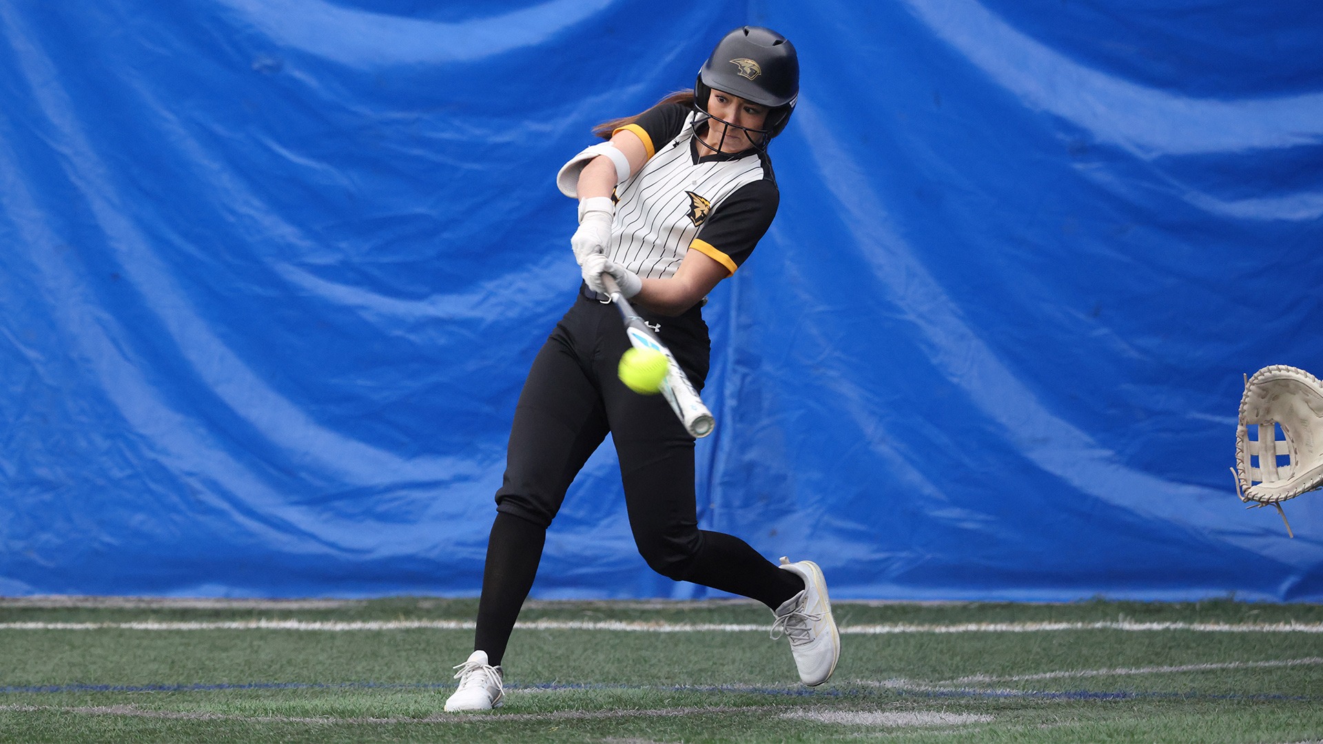 2026 Brianne Lopez Action Shot, hitting against St. Norbert Game 1