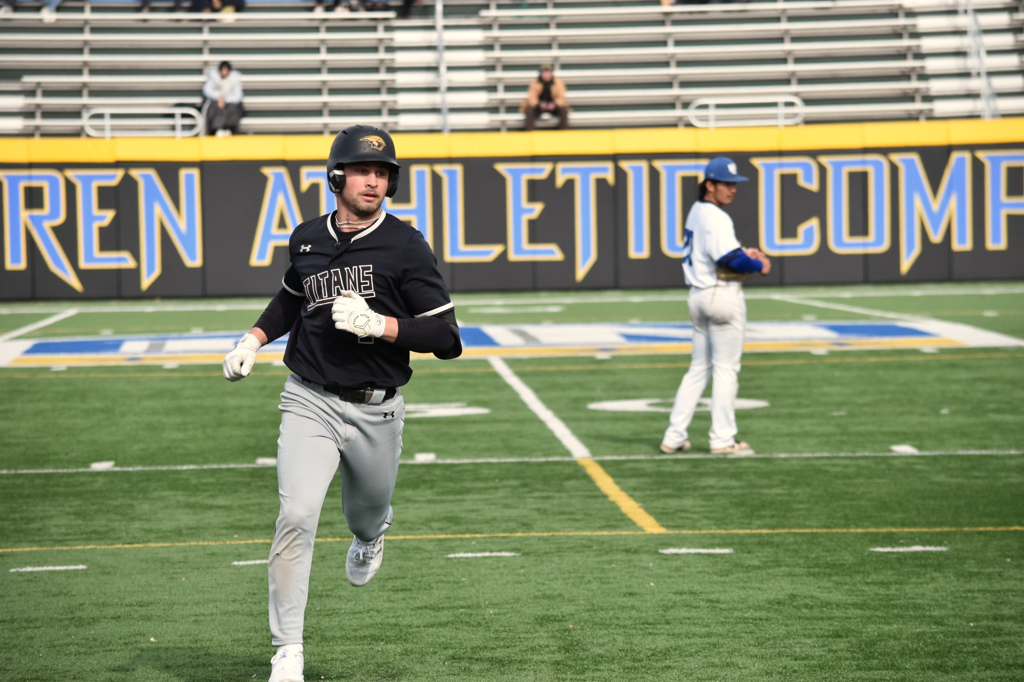 2026 Logan Schill Action Shot, running around the bases after hitting a home run against North Park