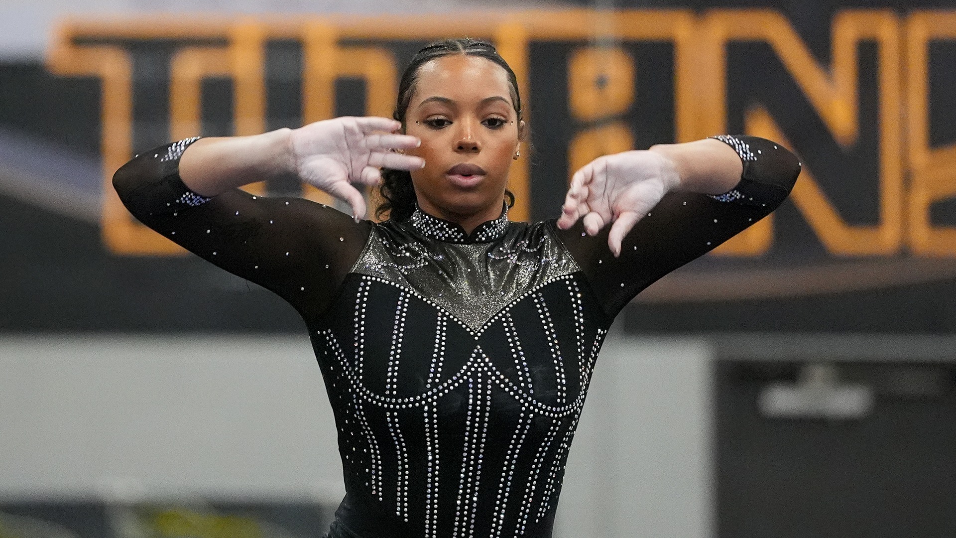 2026 Ome Ellis Action Shot, competing on the balance beam against Stout