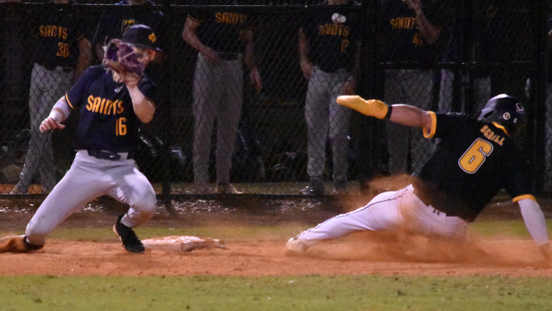 2026 Logan Schill Action Shot, stealing third base against St. Scholastica