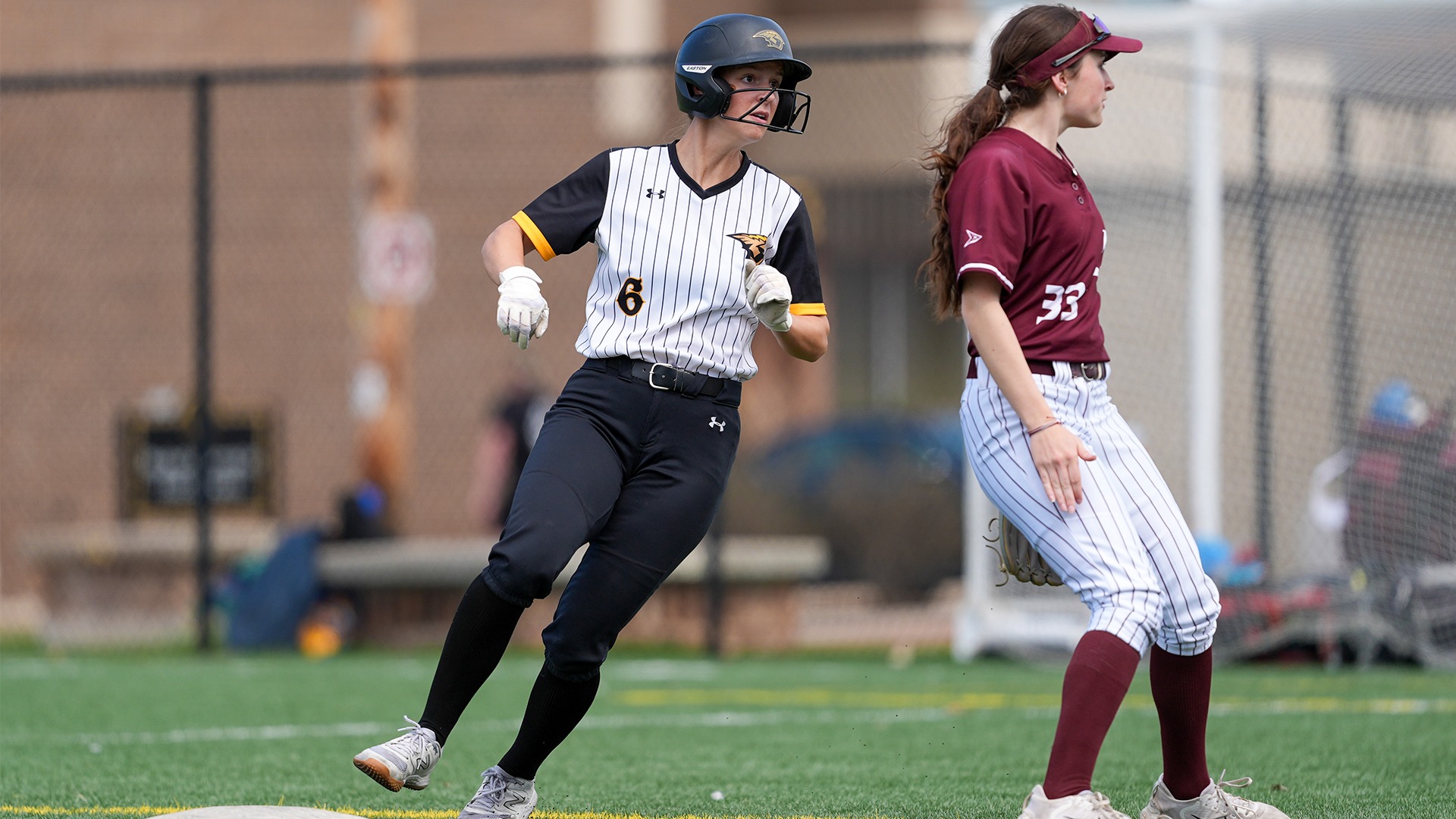 2026 Olivia Baugnet Action Shot, coming into second base against La Crosse- Game 1