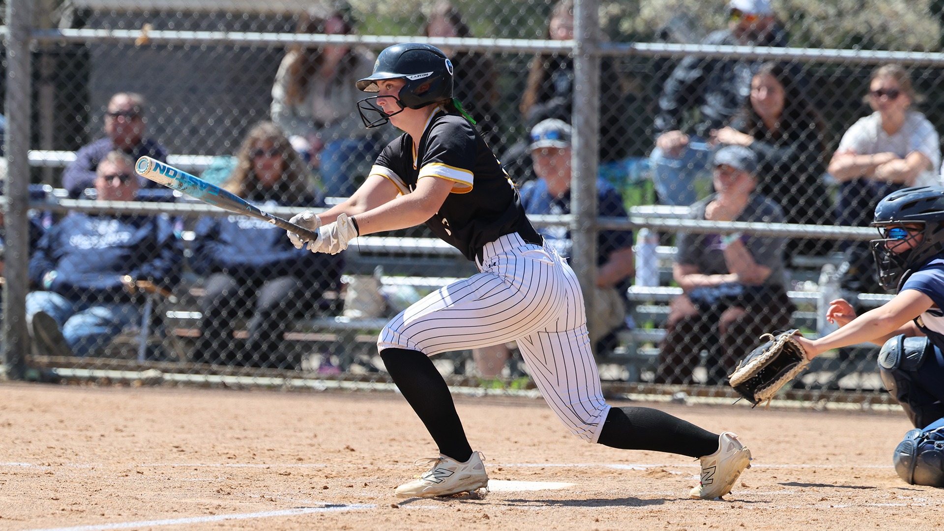 2026 Mary Kate Quaid Action Shot, hitting against Stout