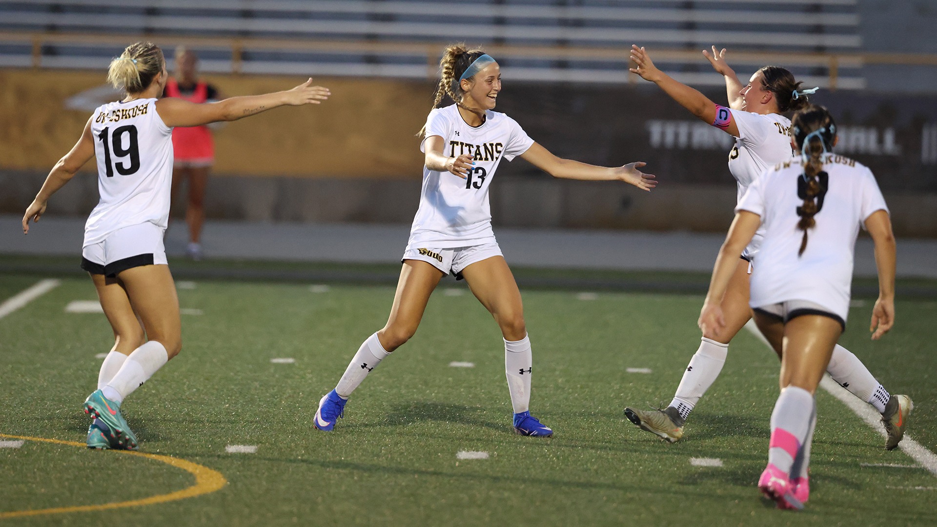 2026 Nadia Epshteyn Action Shot, celebrating with teammates after scoring against St. Norbert