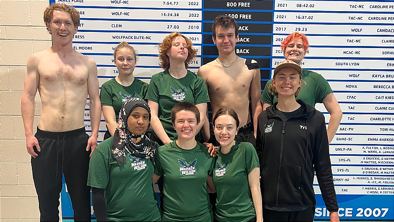 A number of Warren Wilson swim team members gather together at the conference championships