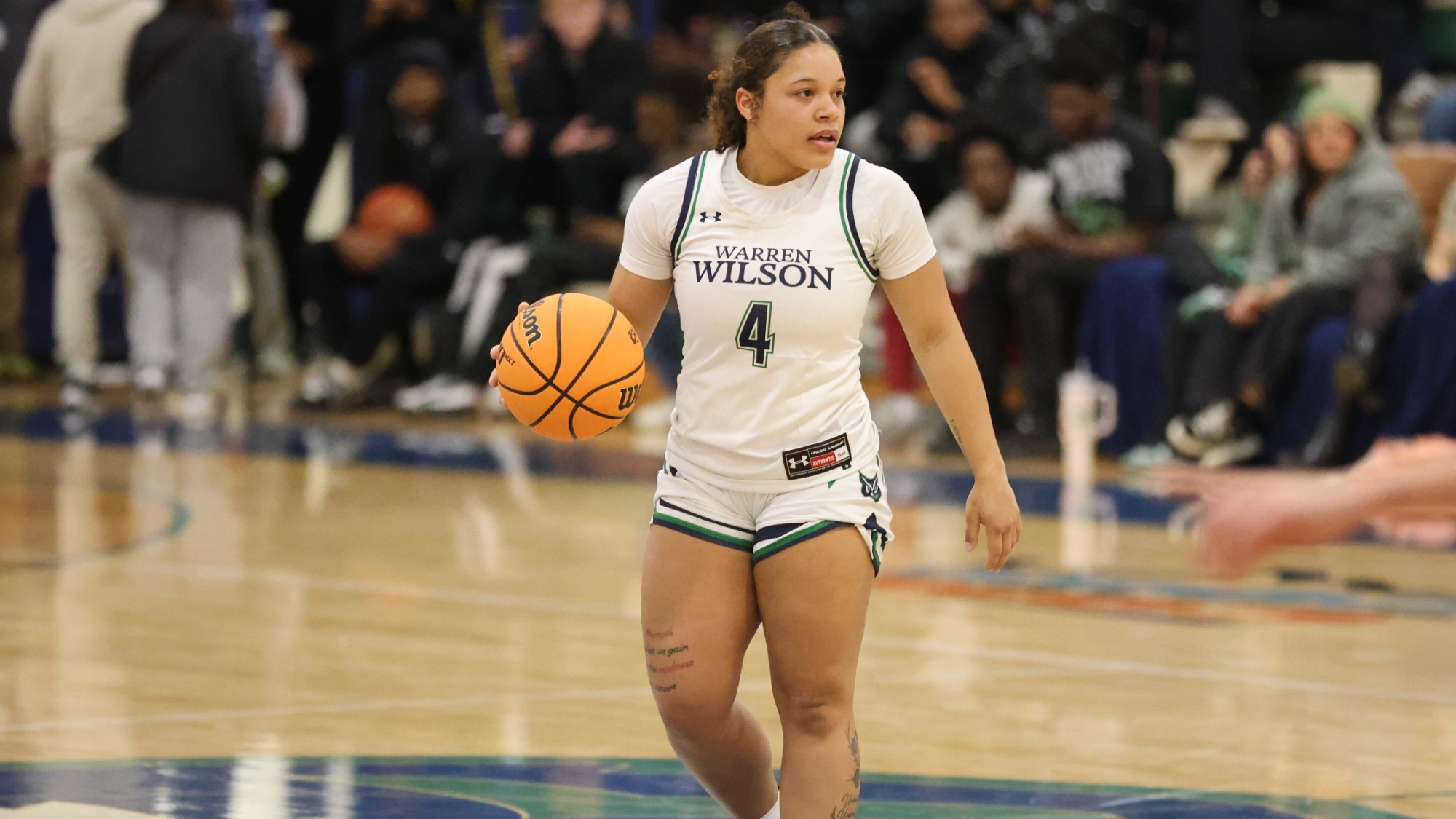 25-26 WBB Ellie Martin Dribbles Ball