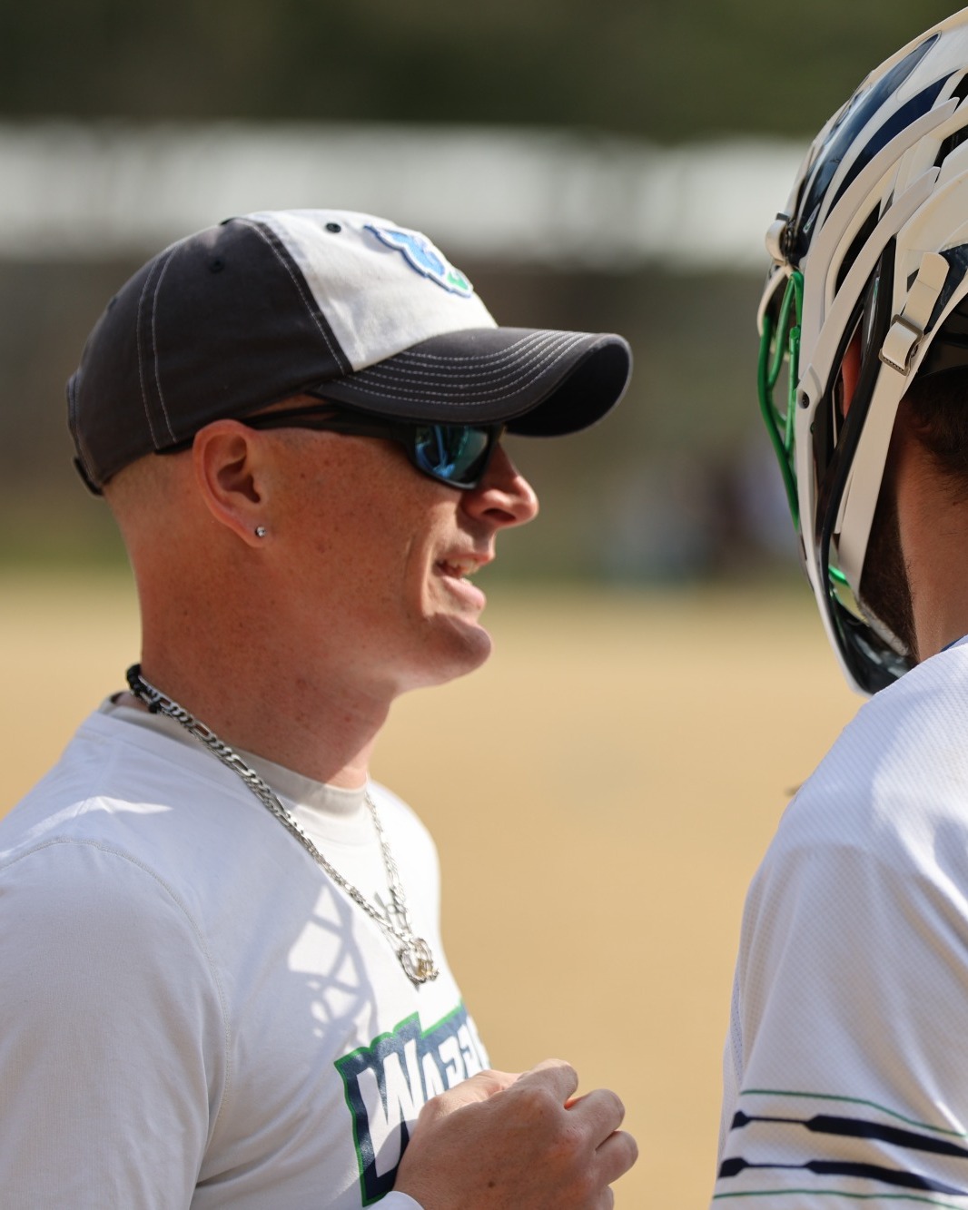 24-25 Warren Wilson College Men's Lacrosse Coach talking to player