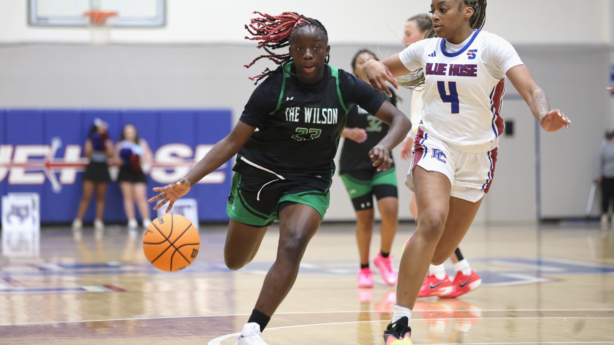 25-26 WBB Ori Galloway dribbles past defender