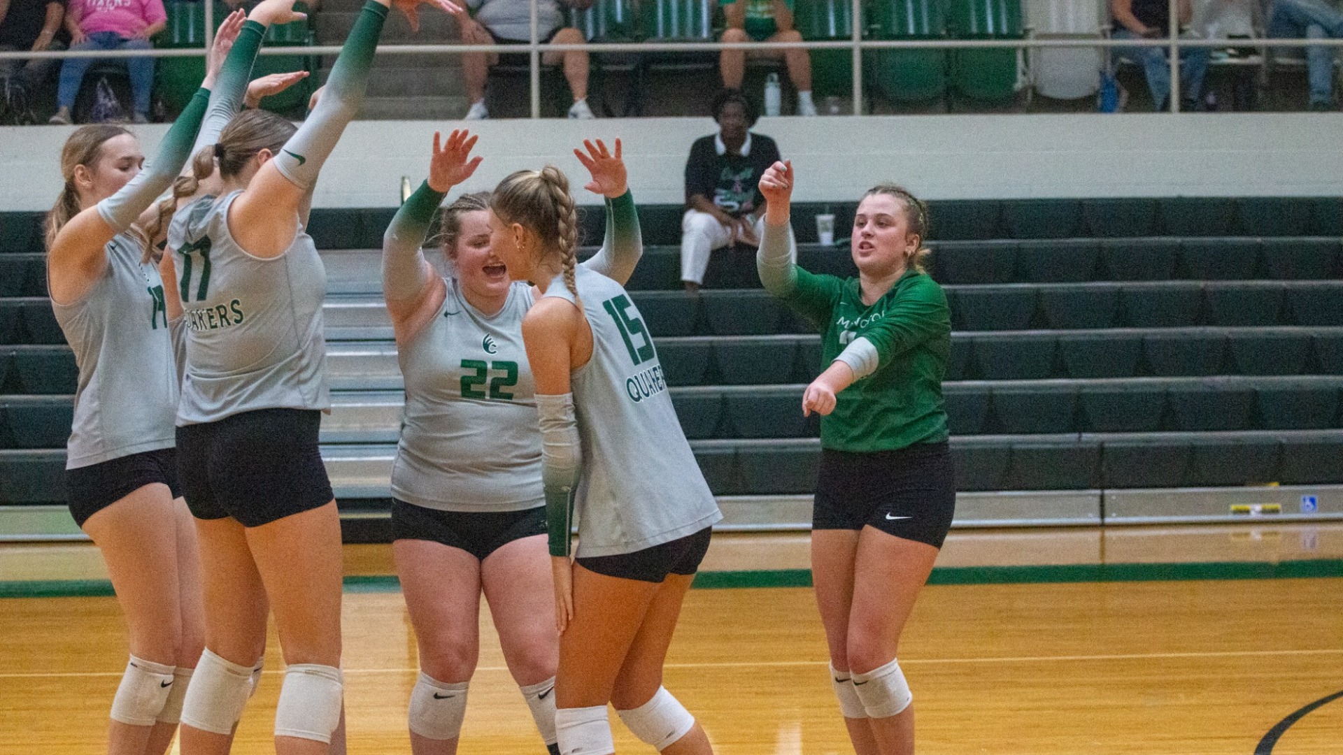 Paige Shouse celebrated with her teammates after a big play